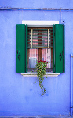 Fototapeta na wymiar Window in coloured Burano, Venice lagoon, Italy