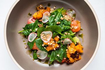 salad with spinach and roasted pumpkin