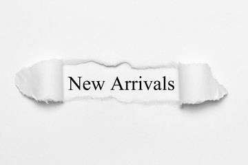 New Arrivals on white torn paper
