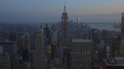Obraz premium New York, Usa:Aerial view of Manhattan midtown and downtown skyscrapers ar sunset and dusk time