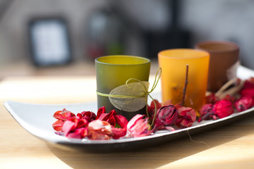The decor. candles with rose petals