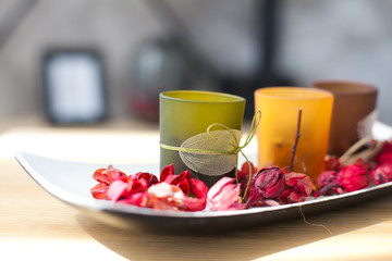 The decor. candles with rose petals