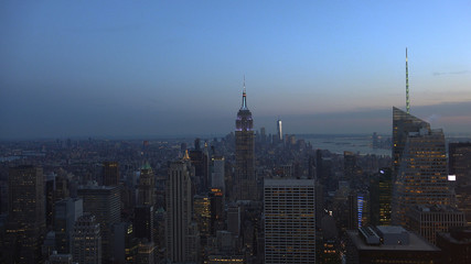 Fototapeta na wymiar New York, Usa:Aerial view of Manhattan midtown and downtown skyscrapers ar sunset and dusk time