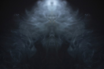 horror smoke texture background in black room . projector light beam in the air . ghost screening concept .