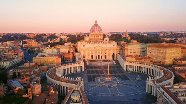 rome aerial shot drone fly orbit on st peter square basilica at sunrise