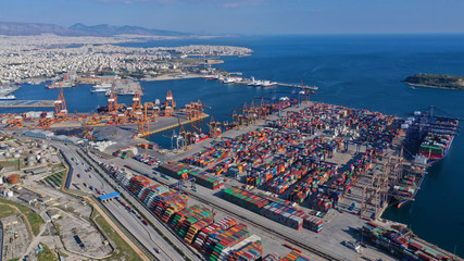 Fototapeta premium Aerial drone photo of industrial container terminal in commercial port of Piraeus, Perama, Attica, Greece