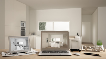 Architect designer desktop concept, laptop and tablet on wooden desk with screen showing interior design project and CAD sketch, blurred draft in the background, modern white kitchen