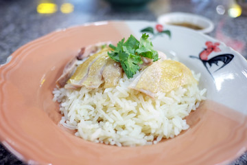 Hainanese chicken rice. Rice steamed with chicken soup.