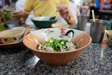 Dry chicken noodle asian street food.
