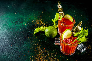 Spicy bloody mary cocktail with garnish . Homemade texmex styled alcohol drink,