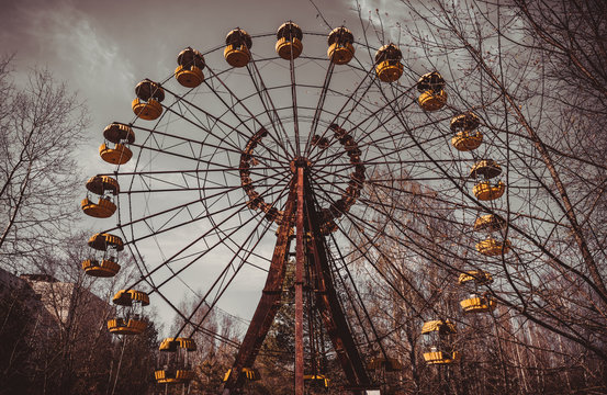 Old ferris wheel in the ghost town of Pripyat. Consequences of the accident at the Chernobil nuclear power plant	