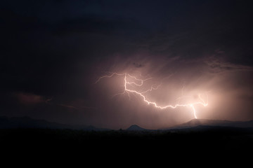 Naklejka na ściany i meble Lightning over Phoenix hills
