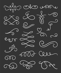 Swirls, borders and dividers vector set. Calligraphic elements on black background