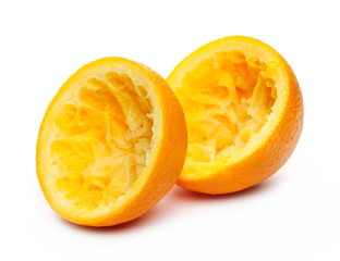 Squeezed orange peel half for juice isolated on white background