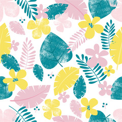 Seamless colorful tropical leaves and floral vector pattern.