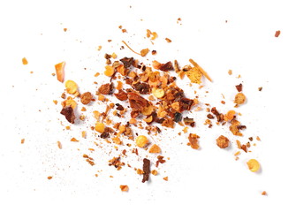 Crushed cayenne pepper and flakes pile isolated on white background