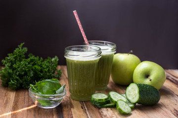 organic diet smoothie with apple and cucumber.  on the shade table.  sorrel. Paleo diet. Spinach. Ingredients.