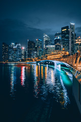 Esplanade Bridge and Downtown Core Skyscrappers at night in Singapore