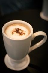 cup of coffee on black background