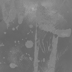 Silver, gray wet abstract paint leaks and splashes texture on white watercolor paper background. Natural organic shapes and design.