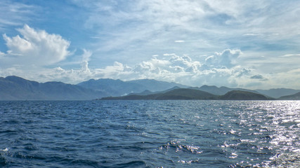 slands in the southern Chinese sea covered with green tropical vegetation