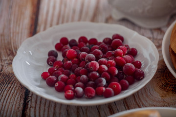 Frozen cranberries in sugar powder close up