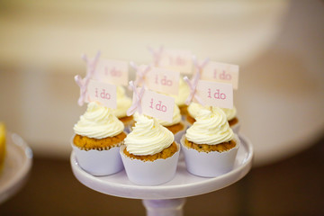 close up with delicious cupcakes with message I do