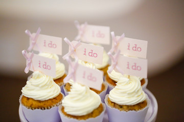 close up with delicious cupcakes with message I do