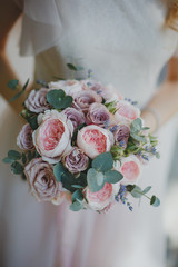  bride holds a bouquet 