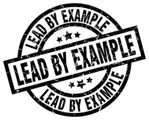 lead by example round grunge black stamp