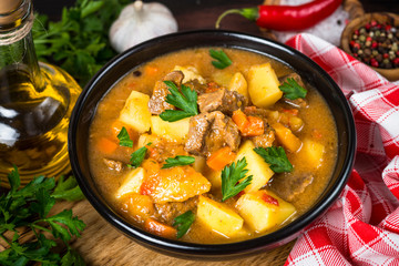 Goulash with meat and vegetables. Beef stew.