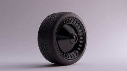 Black Alloy Rim Wheel with a Closed Retro Wheel Design with Racing Tire