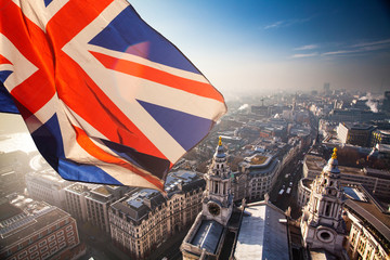 Rooftop view of London and UK flag