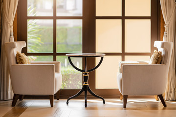 contemporary interior of Living room with part of sofa in sunny day and white curtain interior background concept