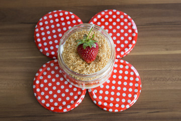 Strawberry Magnolia Dessert on the wooden table for concept.