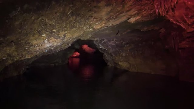 amazing trip to Georgia, Prometheus stone ancient cave with low ceilings, underground tunnel like way to realm of dead, smooth boat traffic on dark water, bright light in fabulous place
