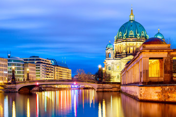 Fototapeta na wymiar Berlin cathedral Berliner Dom in the evening twilight sunset with Spree river and reflections. Berlin, Germany.