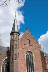 Fototapeta na wymiar tower of church Sint Jansbasiliek in Oosterhout, The Netherlands
