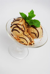 Ice cream in a glass, on a gray background