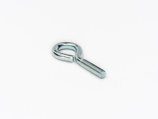 Zinc plated eye bolt screw with metric thread shot on white.