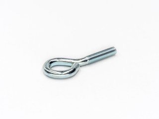 Zinc plated eye bolt screw with metric thread shot on white.