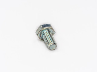Fototapeta premium Zinc plated tap hexagonal metric screw bolt din 933 on white.