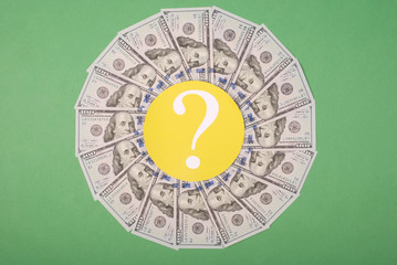 Question mark on mandala kaleidoscope from money.