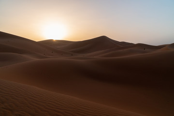 Fototapeta na wymiar Sunrise on sand dunes, Sahara Sand dunes africa morocco