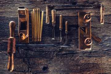 Top of view vintage carpenter tools in a carpentry workshop