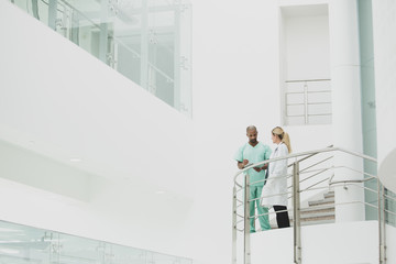 Medical professionals discussing results in a hospital