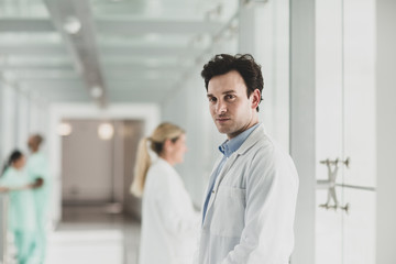 Portrait of confident male Doctor in Hospital