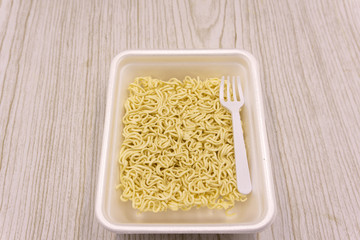 Instant noodles isolated on white background healthy .