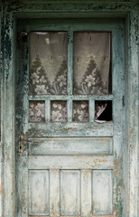 Old doors and windows in an old house in Maremures, Romania