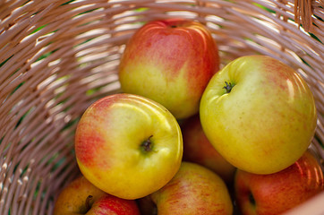 apples in a wooden basket 